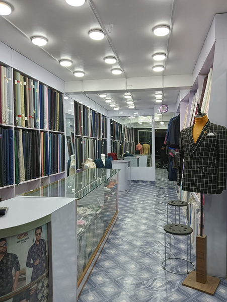 Cover photo of The Designer Tailors